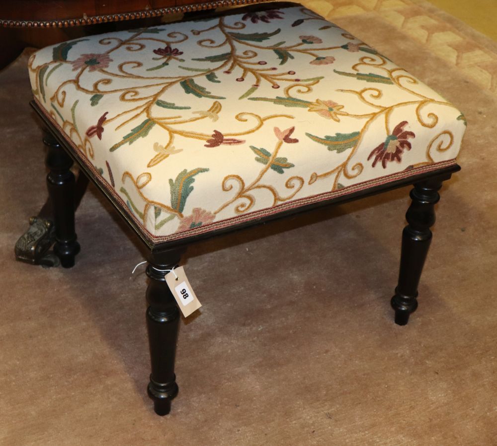 A mid Victorian ebonised dressing stool with upholstered seat, W.56cm, D.50cm, H.46cm